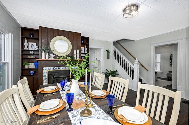 dining room with wood-type flooring