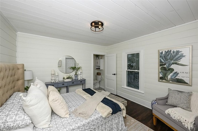 bedroom featuring dark wood-type flooring