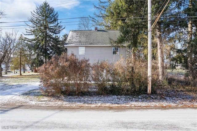 view of snow covered property