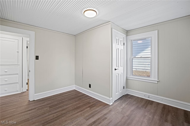 interior space with dark hardwood / wood-style floors