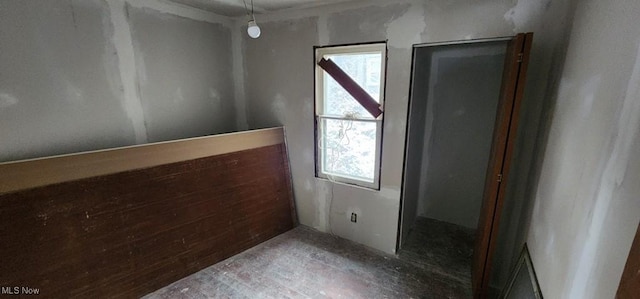 spare room featuring plenty of natural light