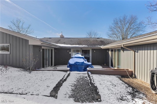 view of snow covered property