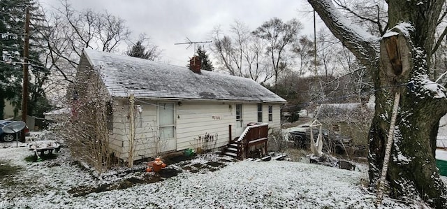 view of snow covered property