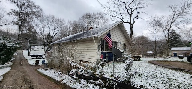 view of snow covered property