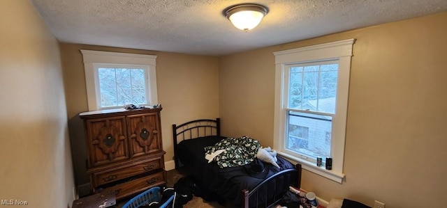 bedroom with a textured ceiling