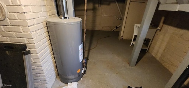 utility room with gas water heater