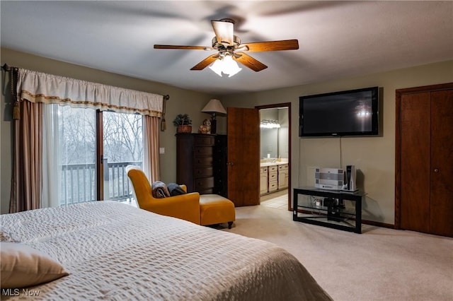 carpeted bedroom featuring ceiling fan, access to outside, and connected bathroom