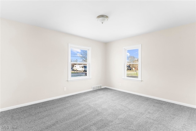 view of carpeted spare room