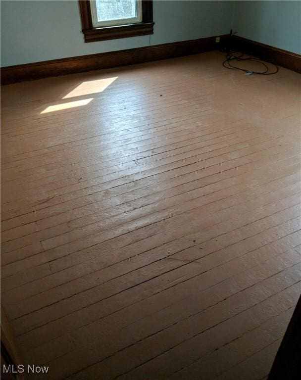 interior details featuring hardwood / wood-style flooring