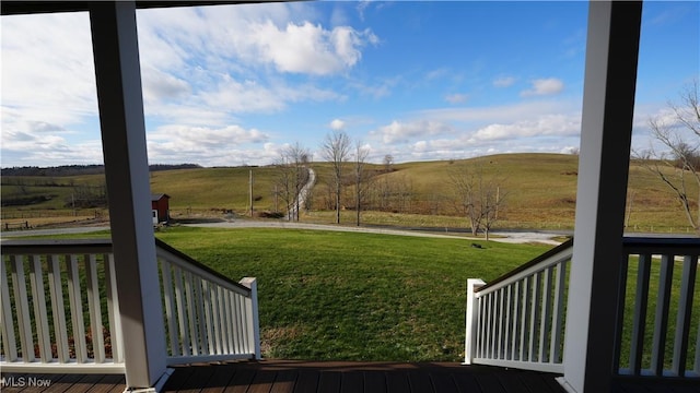 view of yard with a rural view