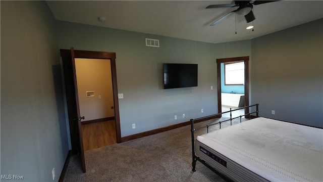 carpeted bedroom featuring ceiling fan