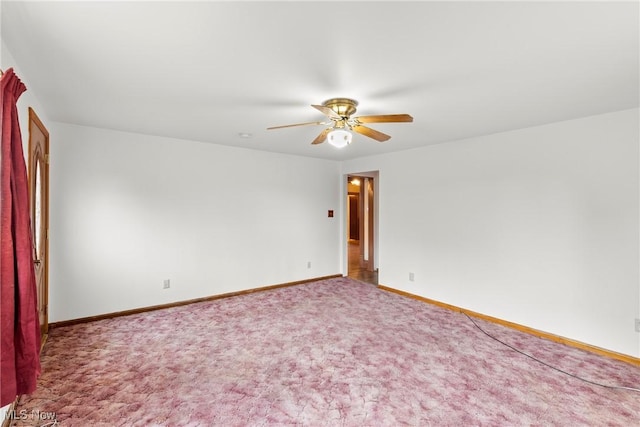 carpeted empty room with ceiling fan