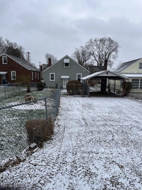 exterior space featuring a carport