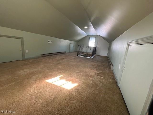 bonus room with carpet flooring, a baseboard radiator, and vaulted ceiling