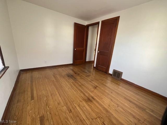 unfurnished bedroom featuring light hardwood / wood-style floors