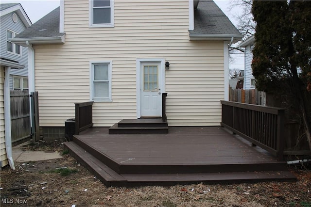 back of property with a deck