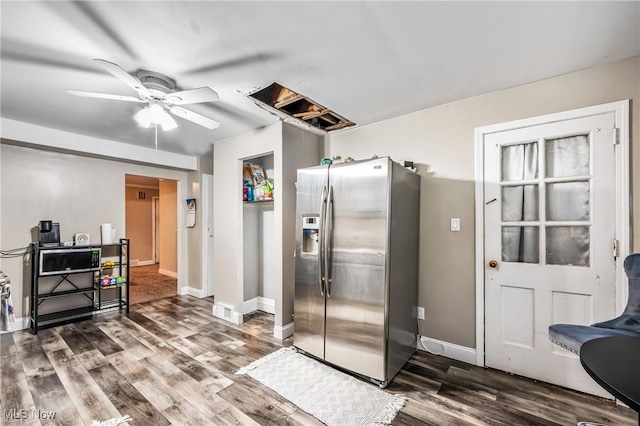 kitchen featuring stainless steel fridge, hardwood / wood-style flooring, and ceiling fan