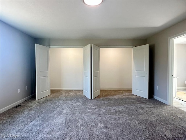 unfurnished bedroom with carpet