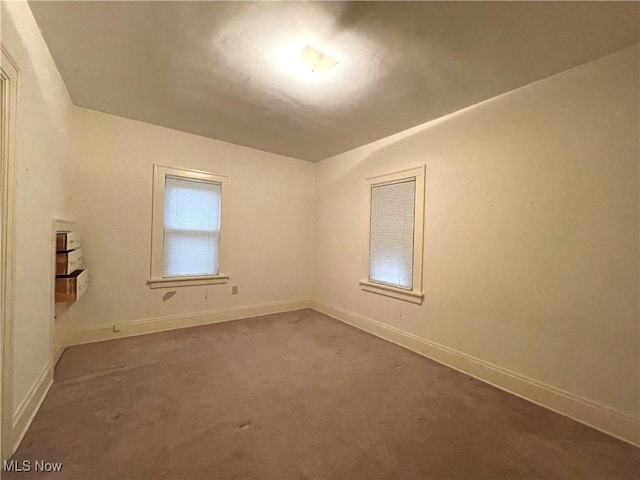 view of carpeted spare room