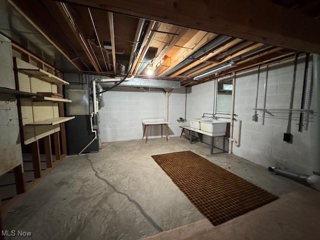 basement with heating unit