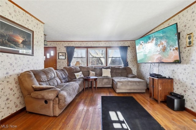 living room featuring ornamental molding and hardwood / wood-style flooring