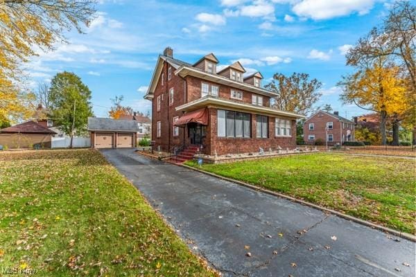 159 Kenilworth Ave SE, Warren, OH 44483 - american foursquare style home featuring brick siding and a front lawn