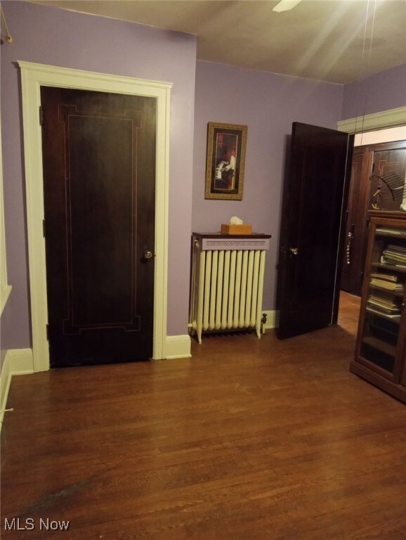 159 Kenilworth Ave SE, Warren, OH 44483 - entryway featuring radiator heating unit and wood finished floors