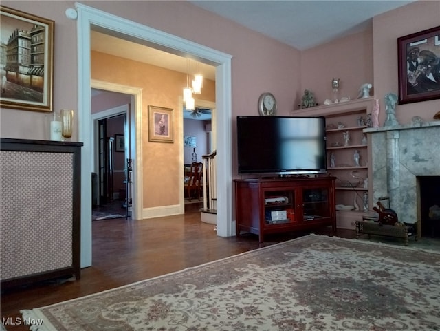 159 Kenilworth Ave SE, Warren, OH 44483 - living room with wood finished floors and a chandelier