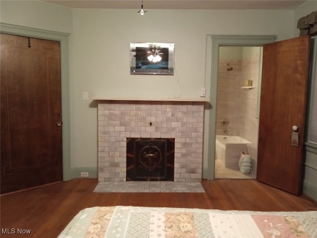 159 Kenilworth Ave SE, Warren, OH 44483 - living room with wood finished floors and a brick fireplace