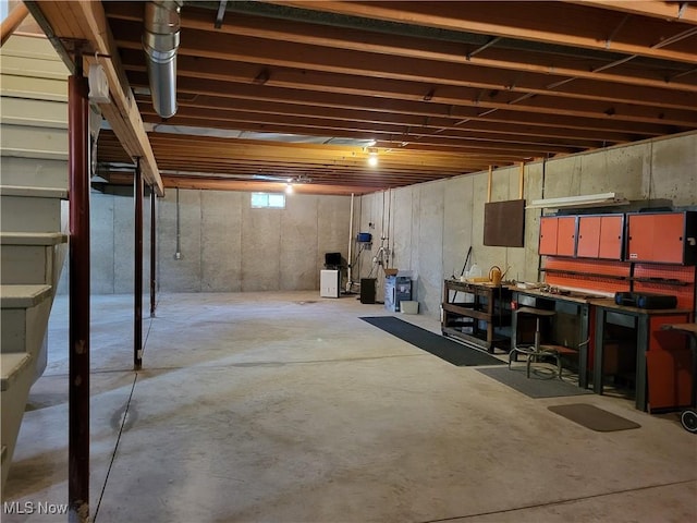 basement with a workshop area