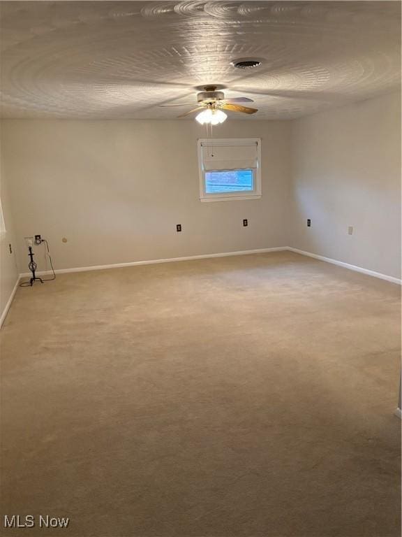 spare room featuring carpet floors