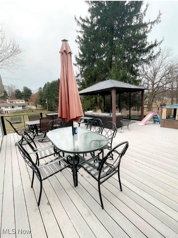 wooden terrace with a gazebo