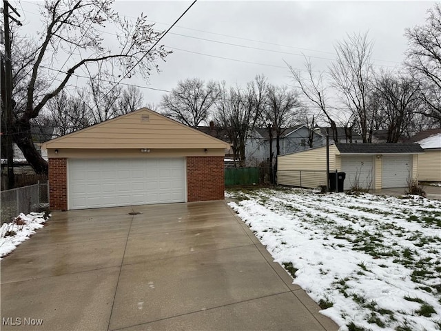 view of snow covered garage