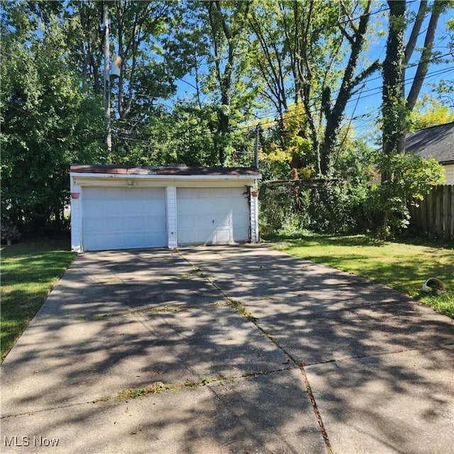 garage with a yard