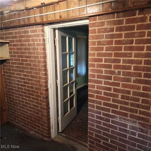 interior space with brick wall