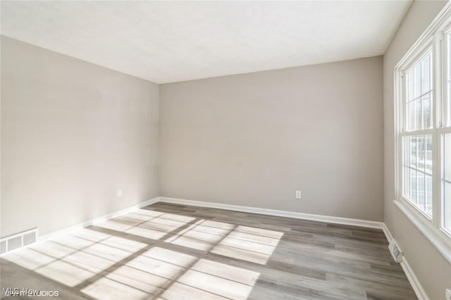 empty room with light wood-type flooring