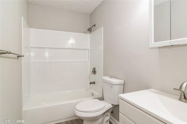 full bathroom with vanity, shower / bath combination, a textured ceiling, and toilet