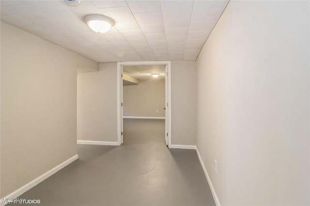 corridor with concrete flooring