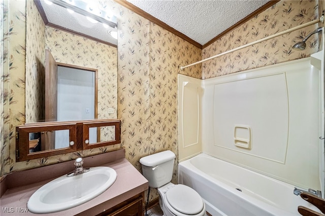 full bathroom featuring vanity, toilet, crown molding, a textured ceiling, and washtub / shower combination