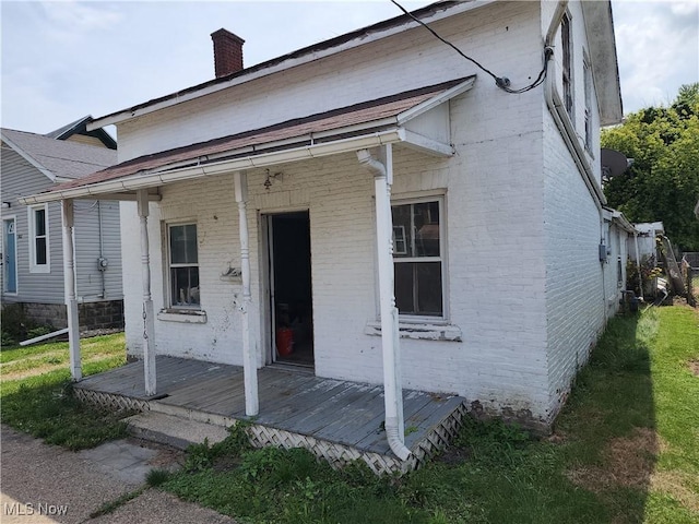 exterior space featuring covered porch