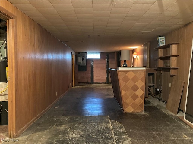 bar with electric panel and wooden walls