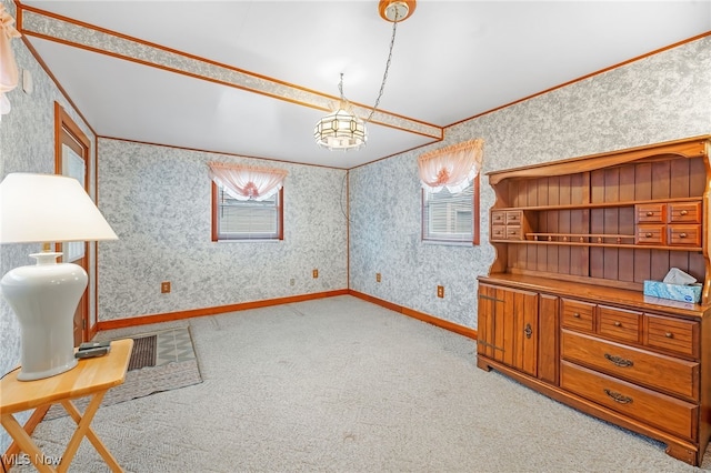 interior space featuring light colored carpet and ornamental molding