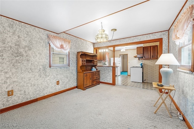 carpeted living room with a chandelier and crown molding