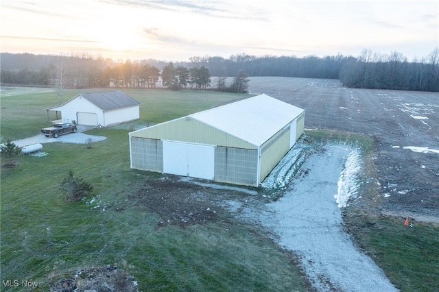 aerial view at dusk with a rural view