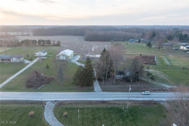 aerial view at dusk with a rural view