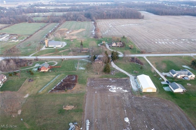 birds eye view of property featuring a rural view