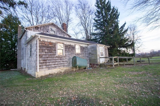 view of home's exterior featuring a lawn