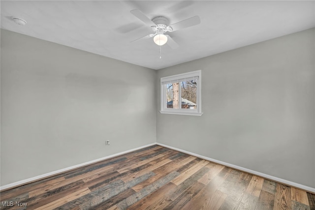 unfurnished room featuring ceiling fan and wood-type flooring