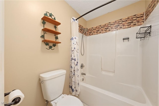 bathroom with shower / bath combo with shower curtain, a textured ceiling, and toilet