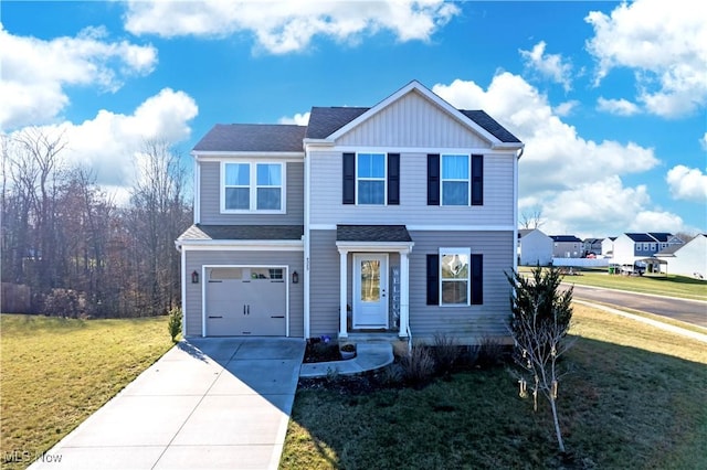 front facade with a front yard and a garage